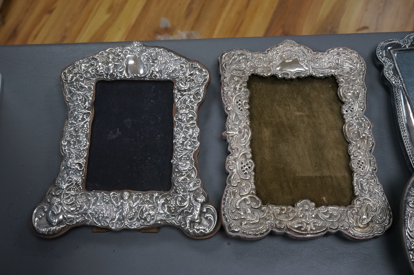 Eight assorted modern silver or sterling mounted photograph frames, including Britannia standard with heart shaped aperture, by CSR Ltd, London, 1981, 12.5cm.